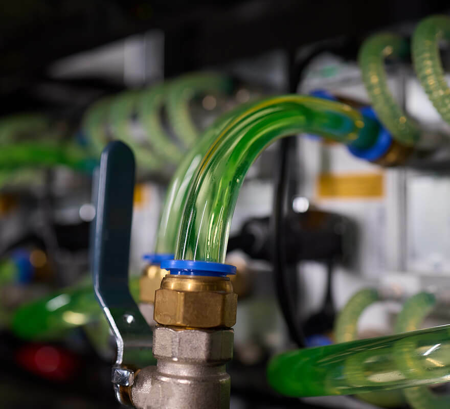 Fluid management piping and ball valve assembly for data center liquid cooling infrastructure